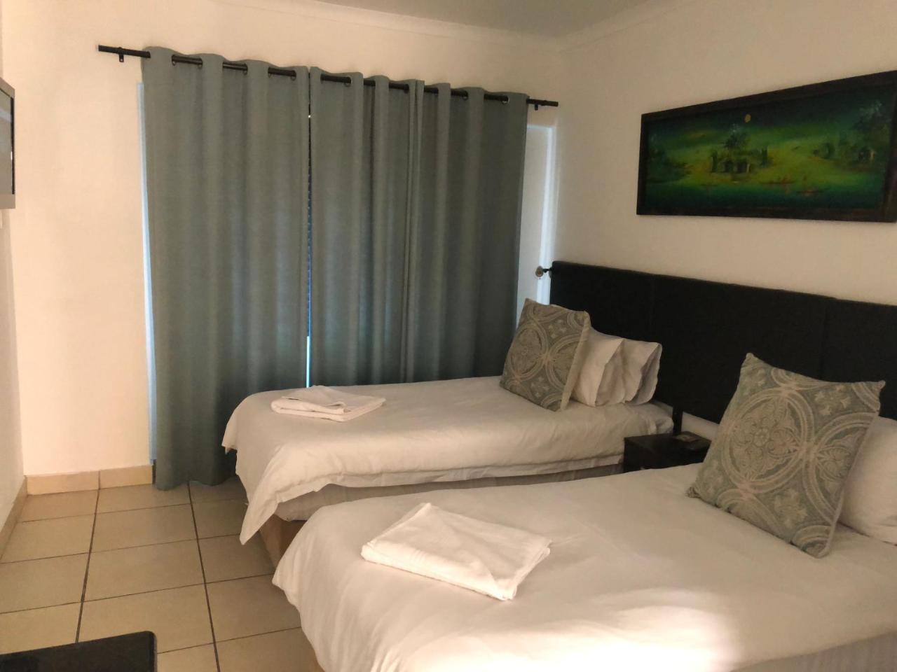 Me Casa Guest House Bluewater Bay Bilik gambar